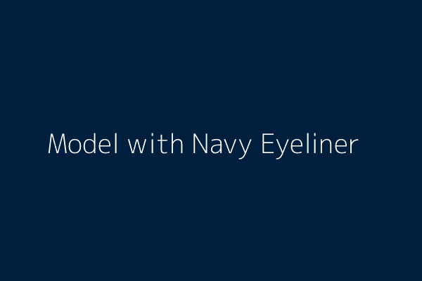 Model wearing bold navy waterproof gel eyeliner, showcasing a dramatic winged look perfect for day or night.