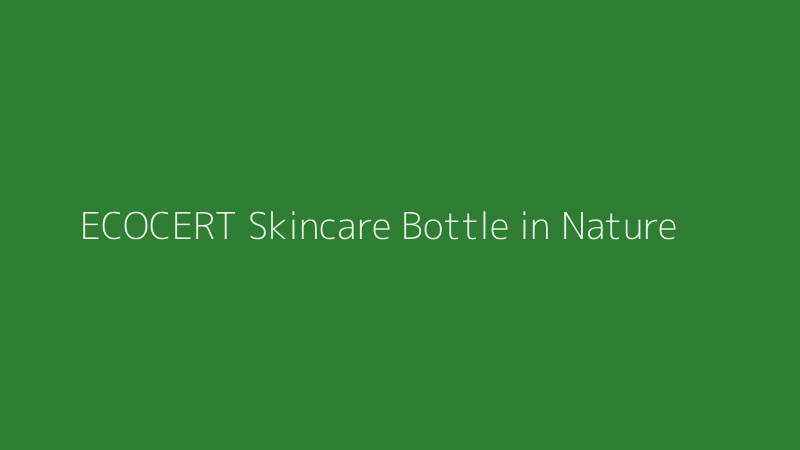 Premium organic skincare bottle with ECOCERT seal displayed in a lush green environment