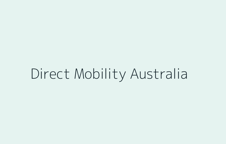 A mobility scooter and a power wheelchair side by side on a quiet suburban footpath